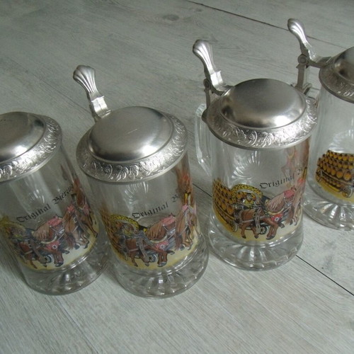 Set of 4 old glass beer steins with metal lids used