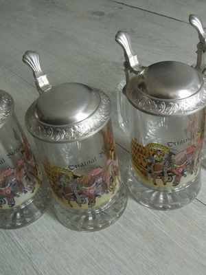 Set of 4 old glass beer steins with metal lids used