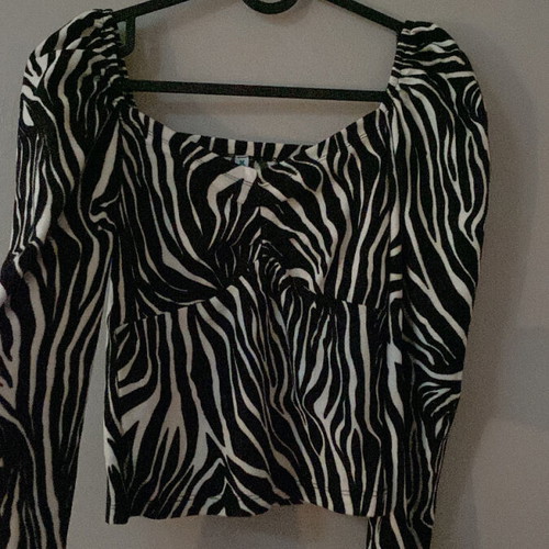 Zebra print blouse new, animal print with puffed shoulder, size S