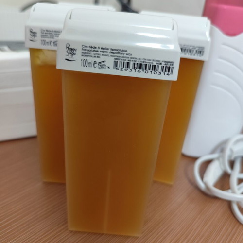 Waxing Kit like new with wax cartridges and strips