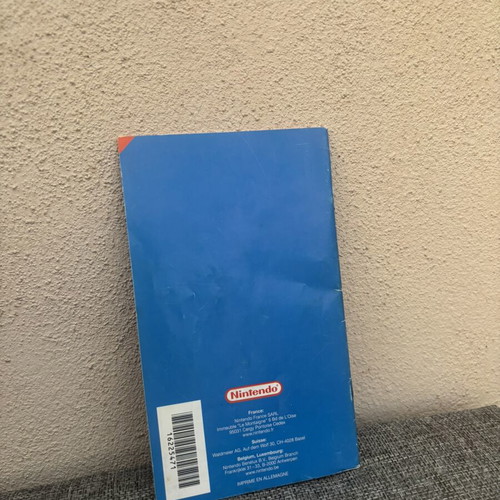 GameCube empty cases with Mario manual