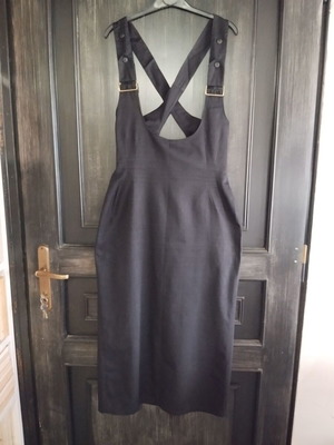 Midi skirt with straps black like new, gabardine fabric