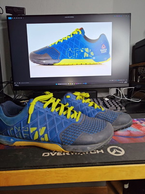 Reebok Crossfit CF74 used athletic shoes size 45.5 blue and yellow