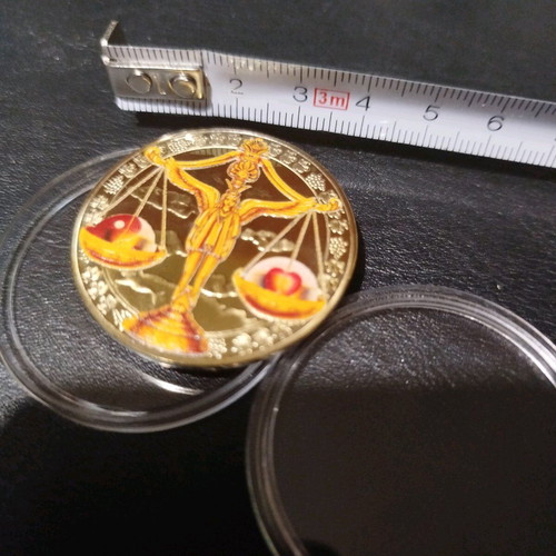 Commemorative Libra coin new, metal with gold tone