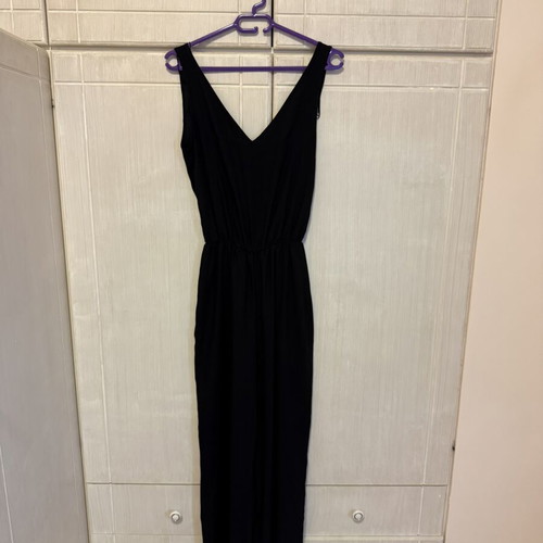 Pink Woman black jumpsuit with open back