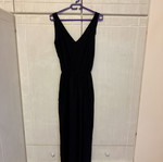 Pink Woman black jumpsuit with open back