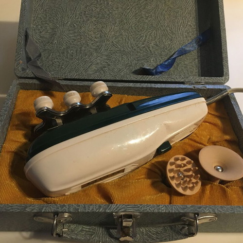 Vintage Remington shaver and massage device used