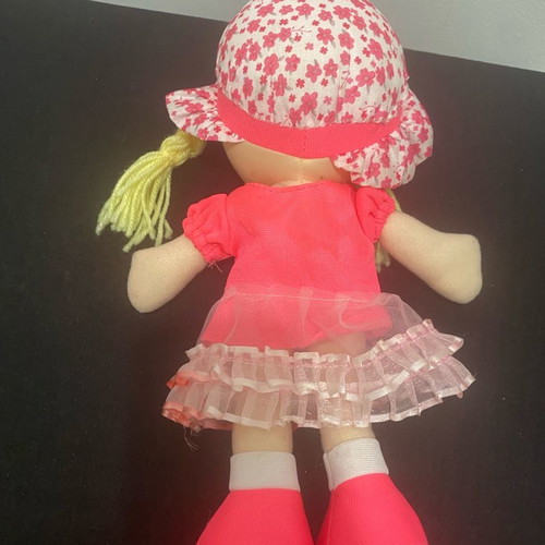 Soft doll used with sewn hat seams