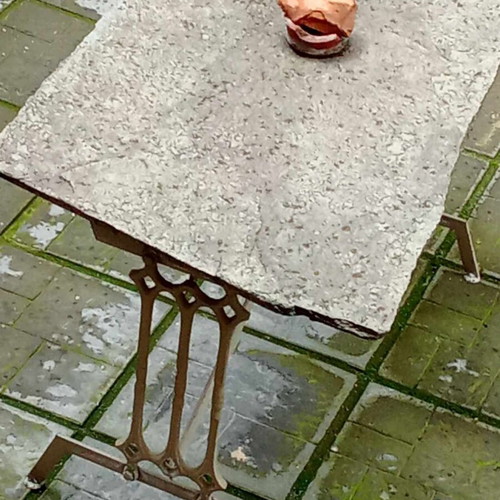 CAST IRON TABLE WITH STONE SURFACE-