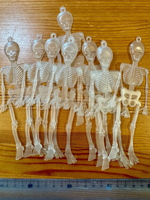 Plastic transparent skeletons like new, pack of 8 for decoration or crafts
