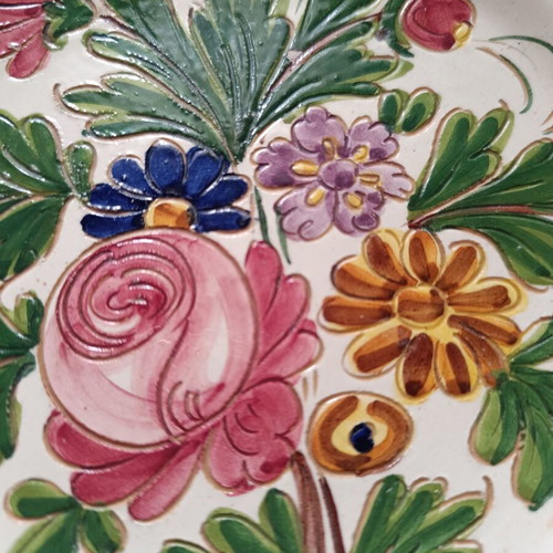 Decorative ceramic plate with hand-engraved floral motif, like new