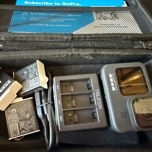GoPro Hero 9 Black action camera with case and battery