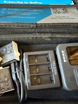 GoPro Hero 9 Black action camera with case and battery