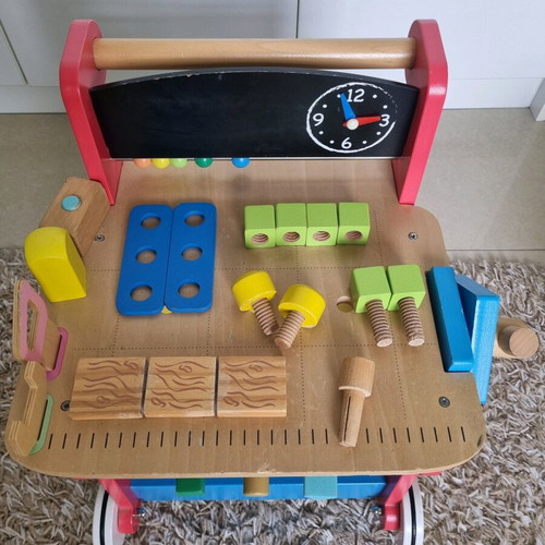 ELC Wooden Activity Workbench used with accessories