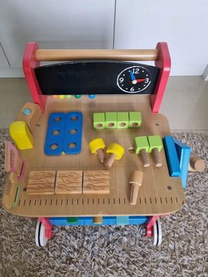 ELC Wooden Activity Workbench used with accessories