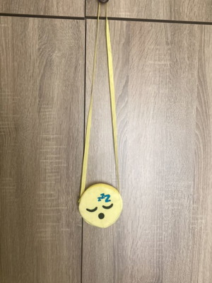 Children's wallet face design like new, yellow, with zipper and strap