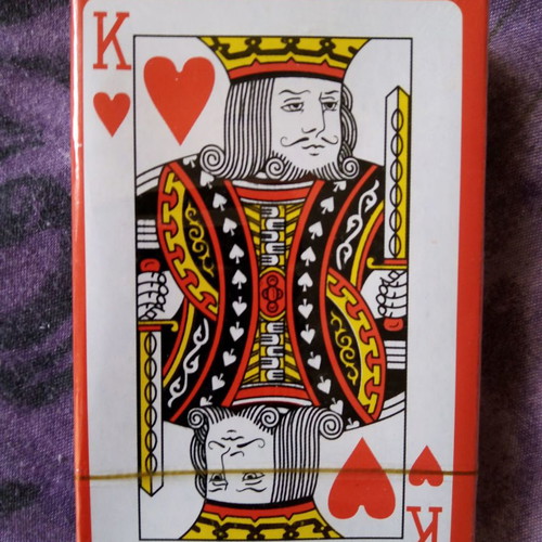 Playing cards new in sealed pack with 54 cards