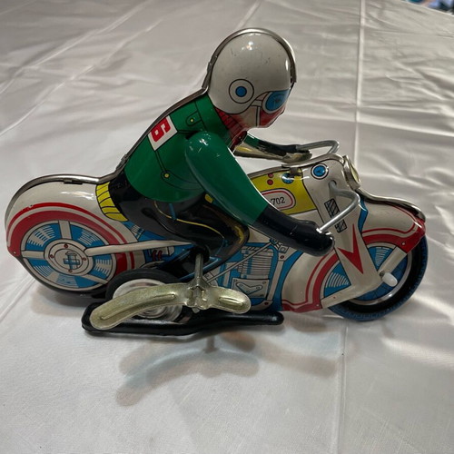 Motorcyclist old tin toy like new