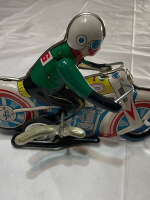 Motorcyclist old tin toy like new