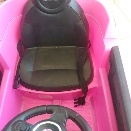 Children's Car Pink electric car with battery and charger. FIAT 500