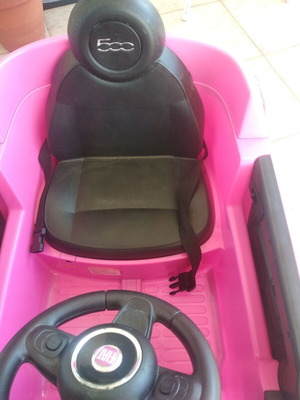 Children's Car Pink electric car with battery and charger. FIAT 500