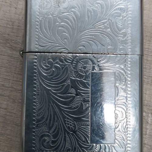 Zippo lighter used with small dent
