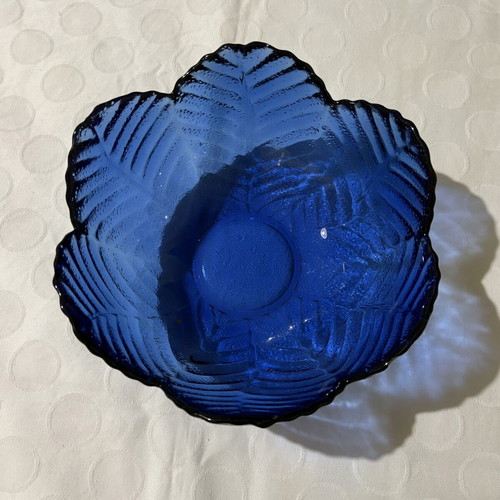 Vintage round blue glass vase with embossed flower design