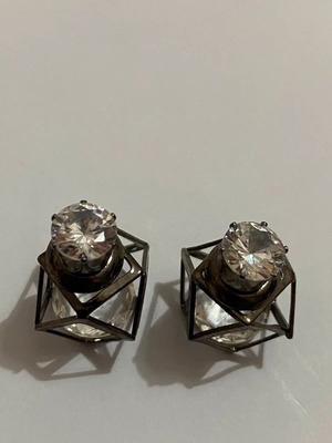 Earrings used, silver color