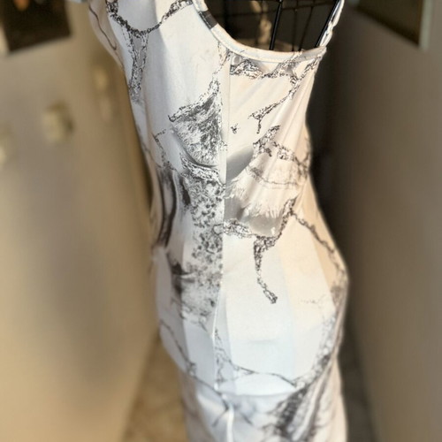 Mini dress with marble print like new, fitted with draped neckline