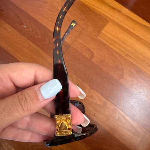 Louis Vuitton sunglasses used with case and small bag brown