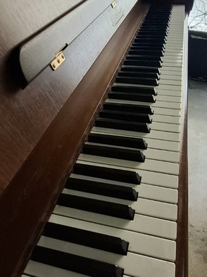 Schimmel upright piano with Renner mechanism