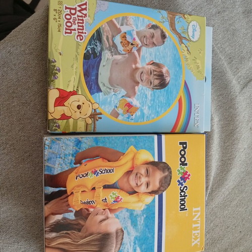 Disney armbands and Intex inflatable life vest new