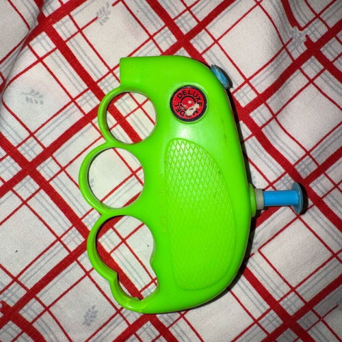 Water gun iron knuckle 90s vintage used in good condition