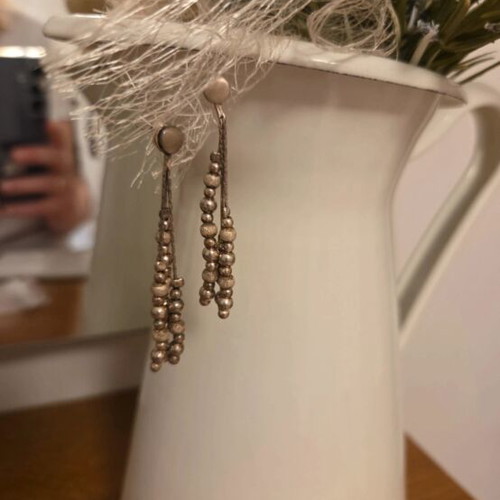 Earrings, bracelet and necklace used, silver color