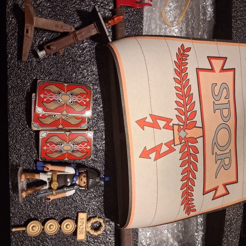 Playmobil Roman set used with character, gun, helmet, shields, boat, and horses
