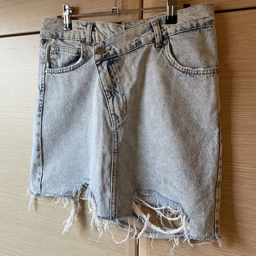 Mini denim skirt Stradivarius like new, light blue with frayed edges