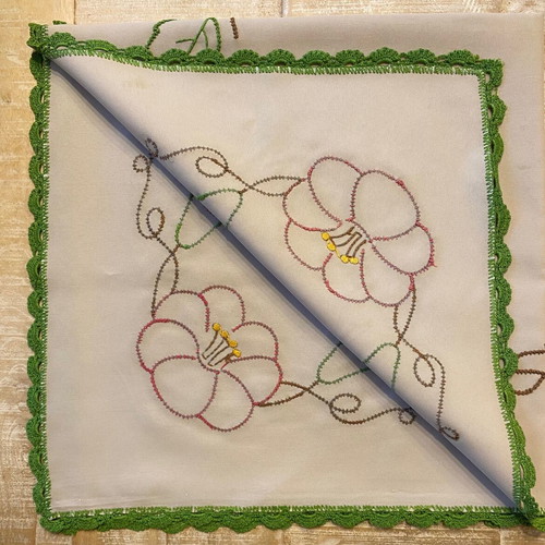 Handmade tablecloth with embroidery and lace used