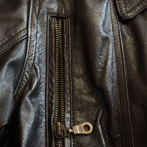 Leather jacket new with matching belt, unisex, black