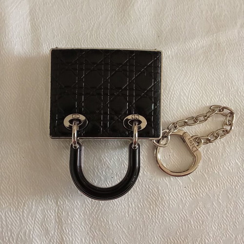Christian Dior keychain with lipstick, like new, black and silver