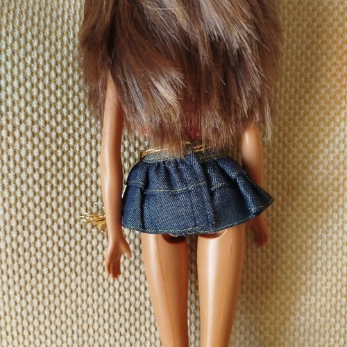 Barbie doll by Mattel like new with denim skirt and gold details