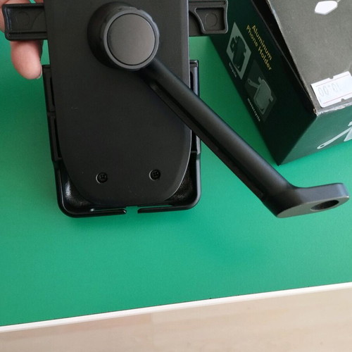 Metal phone holder for motorcycles like new, screws on mirror