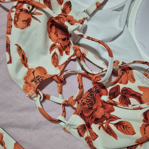 Floral bikini set with high-waisted slip and bustier top size L like new