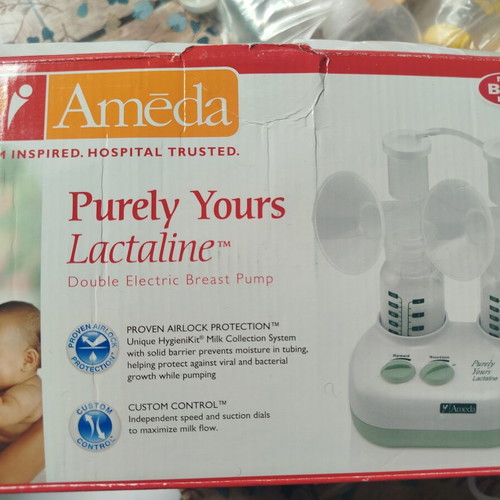 Ameda Double Breast Pump like new with 3 bottles and milk storage bags