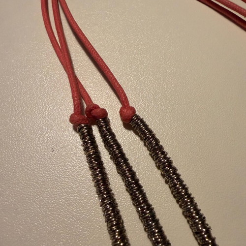 Pendant like new with 3 rows, orange and silver