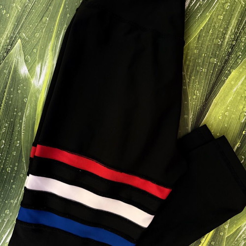 Lismina black leggings with stripes, size large, like new