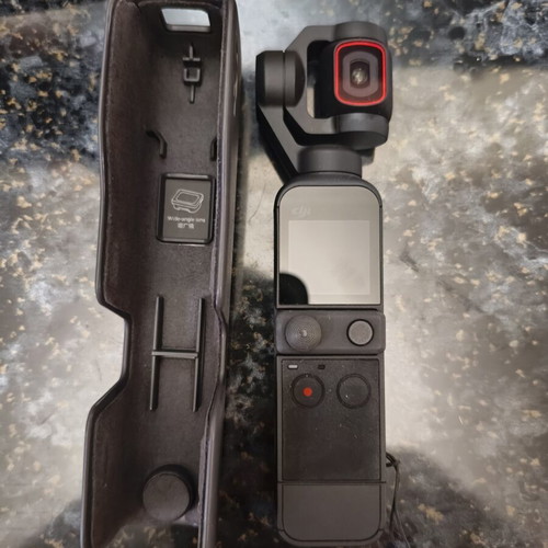 DJI Osmo Pocket 2 like new with tripod and phone holder set