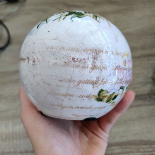Ceramic decorative item with decoupage technique used