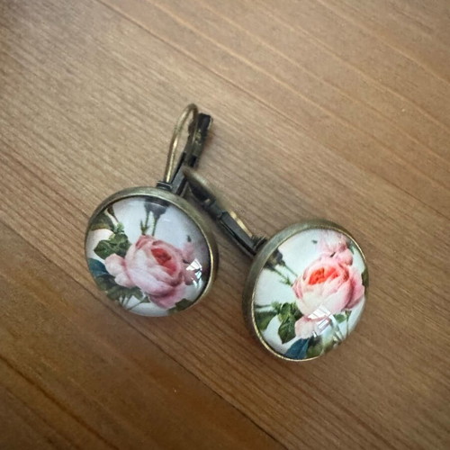 Earrings with rose like new