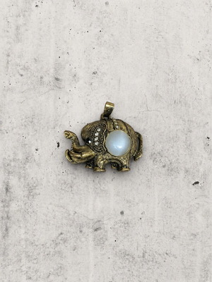 Elephant pendant used with vintage white opal-like stone