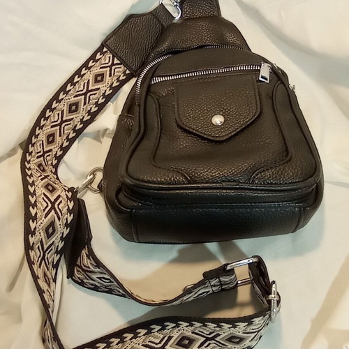 Black Sling Bag Crossbody backpack like new with wide strap and multiple pockets